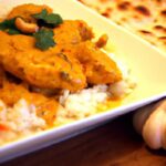 Savoring Butter Chicken and Garlic Naan: A Flavorful Duo